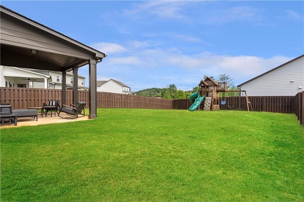 5 bedroom, 3 bathroom, 2,535 sq ft single family residence for sale at 5316 Milford Drive, Flowery Branch, GA 30507 — photo 5