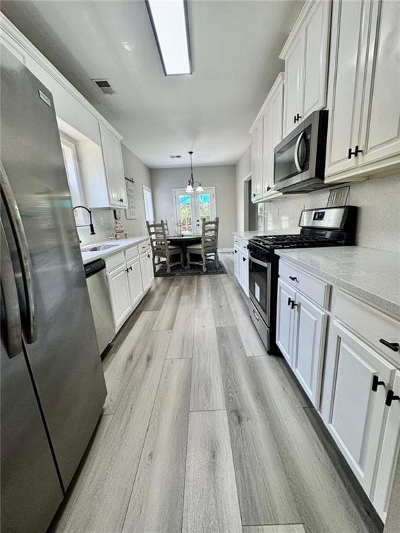 5 bedroom, 3 bathroom, 2,456 sq ft single family residence for sale at 767 Edgeley Lane, Lawrenceville, GA 30044 — photo 9