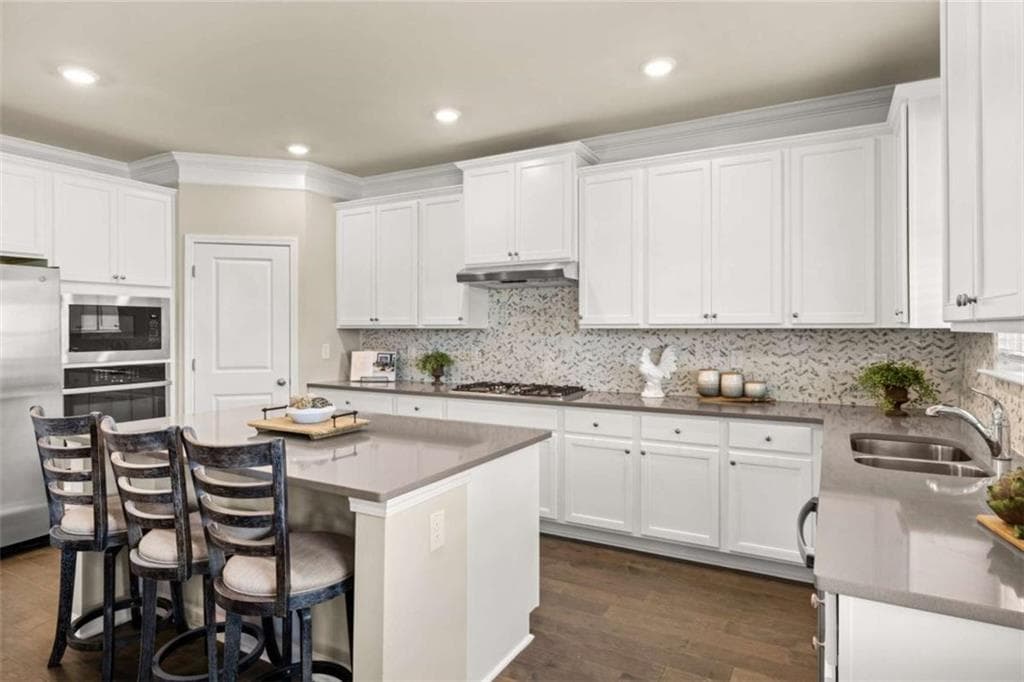 5 bedroom, 4 bathroom, 3,167 sq ft single family residence for sale at 1807 Kingsmere Run Drive, Loganville, GA 30052 — photo 10