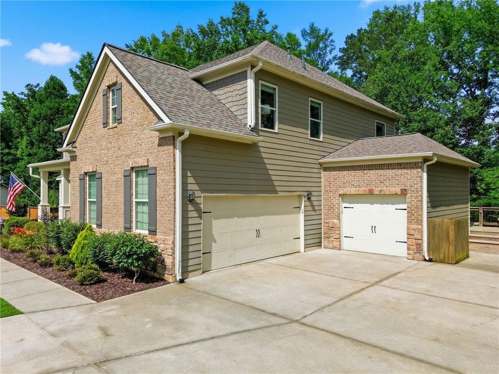 5 bedroom, 4 bathroom, 4,105 sq ft single family residence for sale at 3540 Ansley Manor Court, Cumming, GA 30028 — photo 3