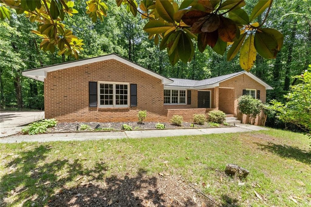 4 bedroom, 3 bathroom, 3,040 sq ft single family residence for sale at 20 Pine Lake Drive, Cumming, GA 30040