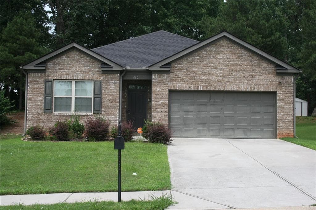 4 bedroom, 2 bathroom, 2,375 sq ft single family residence sold at 610 Dodson Lake Court, Fairburn, GA 30213