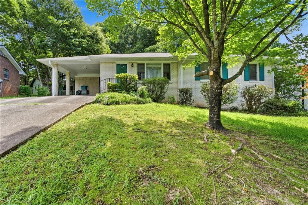 3 bedroom, 2 bathroom, 1,440 sq ft single family residence for sale at 6574 Amity Court, Rex, GA 30273 — photo 2