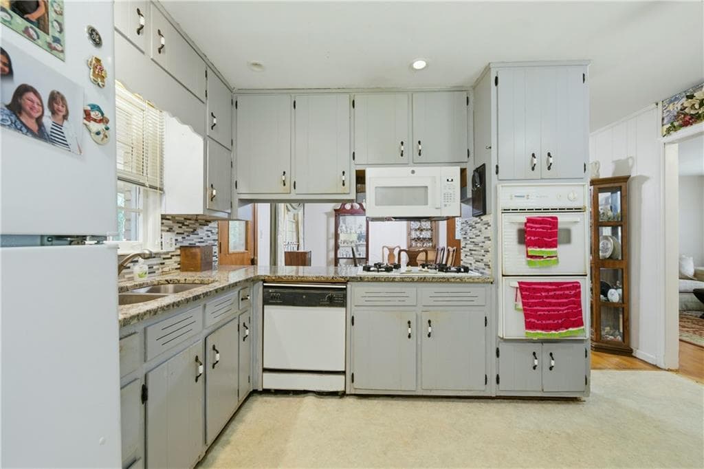 3 bedroom, 2 bathroom, 1,440 sq ft single family residence for sale at 6574 Amity Court, Rex, GA 30273 — photo 4