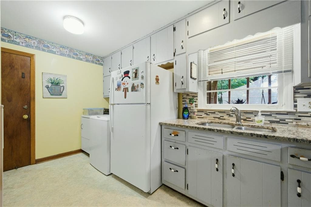 3 bedroom, 2 bathroom, 1,440 sq ft single family residence for sale at 6574 Amity Court, Rex, GA 30273 — photo 6