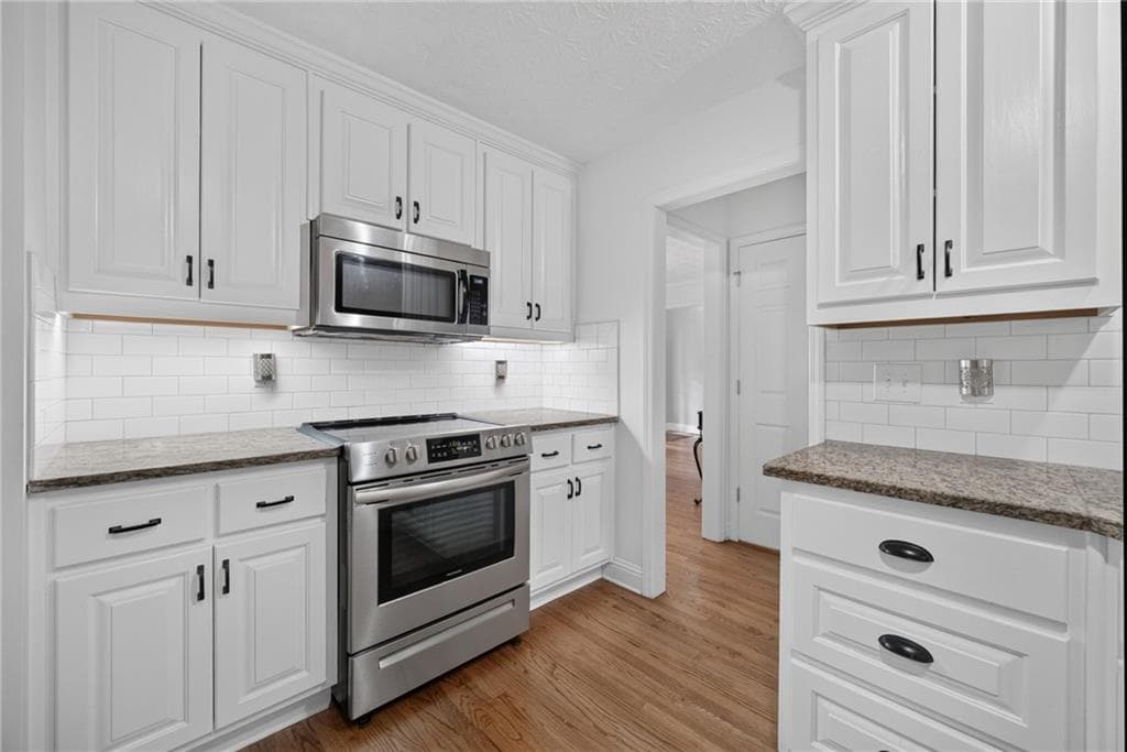 4 bedroom, 4 bathroom, 2,047 sq ft single family residence for sale at 946 Golden Meadows Lane, Loganville, GA 30052 — photo 7