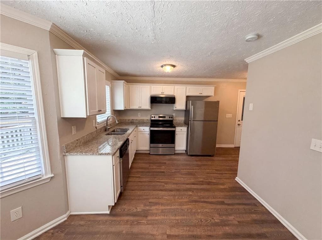 4 bedroom, 3 bathroom, 1,408 sq ft single family residence for sale at 4078 Tara Court, Loganville, GA 30052 — photo 2