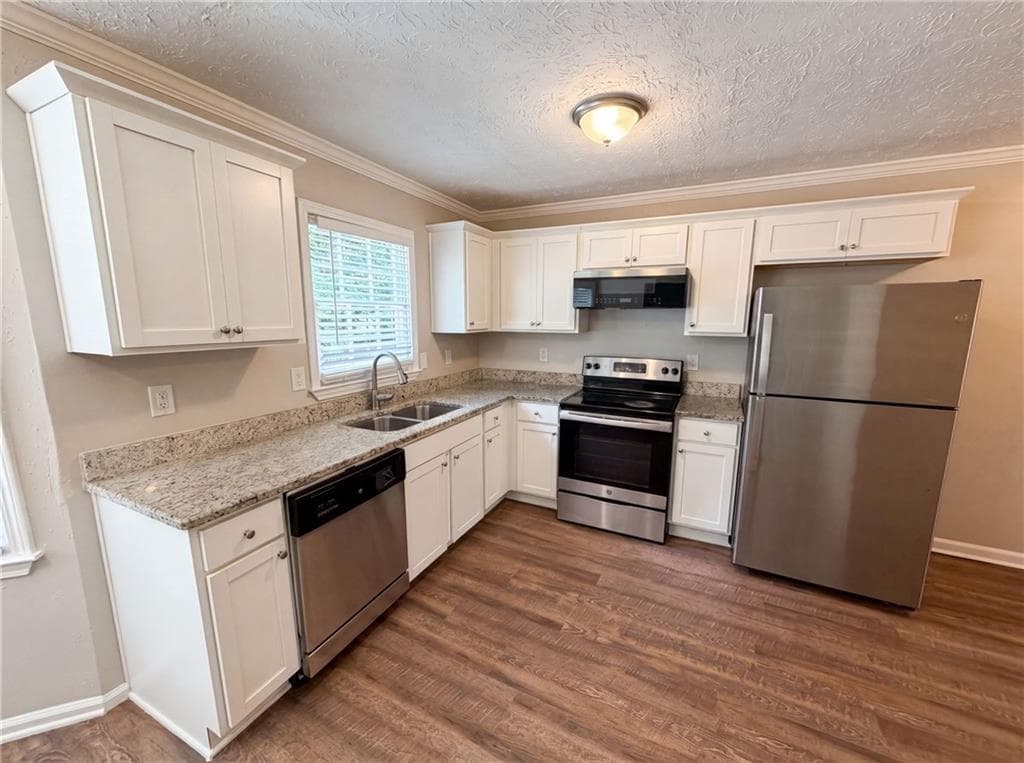 4 bedroom, 3 bathroom, 1,408 sq ft single family residence for sale at 4078 Tara Court, Loganville, GA 30052 — photo 6