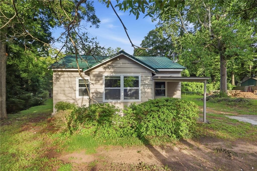 2 bedroom, 1 bathroom, 1,197 sq ft single family residence for sale at 242 N Dogwood Avenue, Social Circle, GA 30025 — photo 3