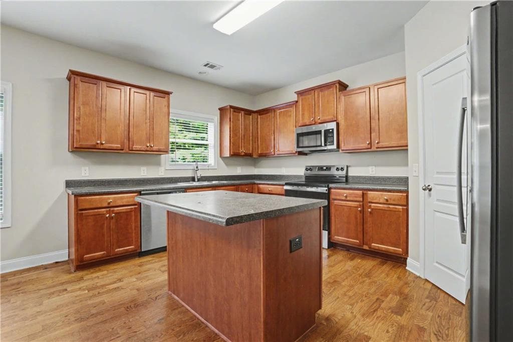 4 bedroom, 3 bathroom, 2,957 sq ft single family residence for sale at 9015 Montclair Hills Drive, Cumming, GA 30028 — photo 10