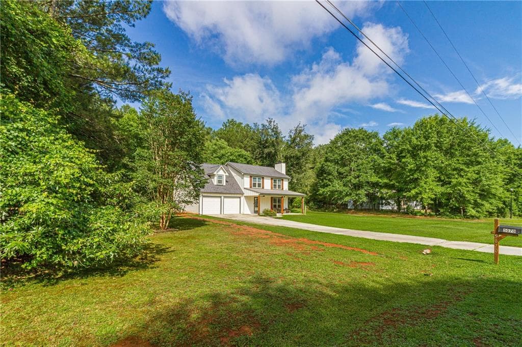 3 bedroom, 3 bathroom, 1,457 sq ft single family residence for sale at 5070 Hudson Road, Loganville, GA 30052 — photo 4