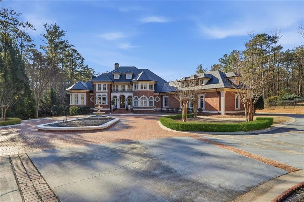 6 bedroom, 10 bathroom, 12,079 sq ft single family residence for sale at 4960 Butner Road, Atlanta, GA 30349 — photo 2