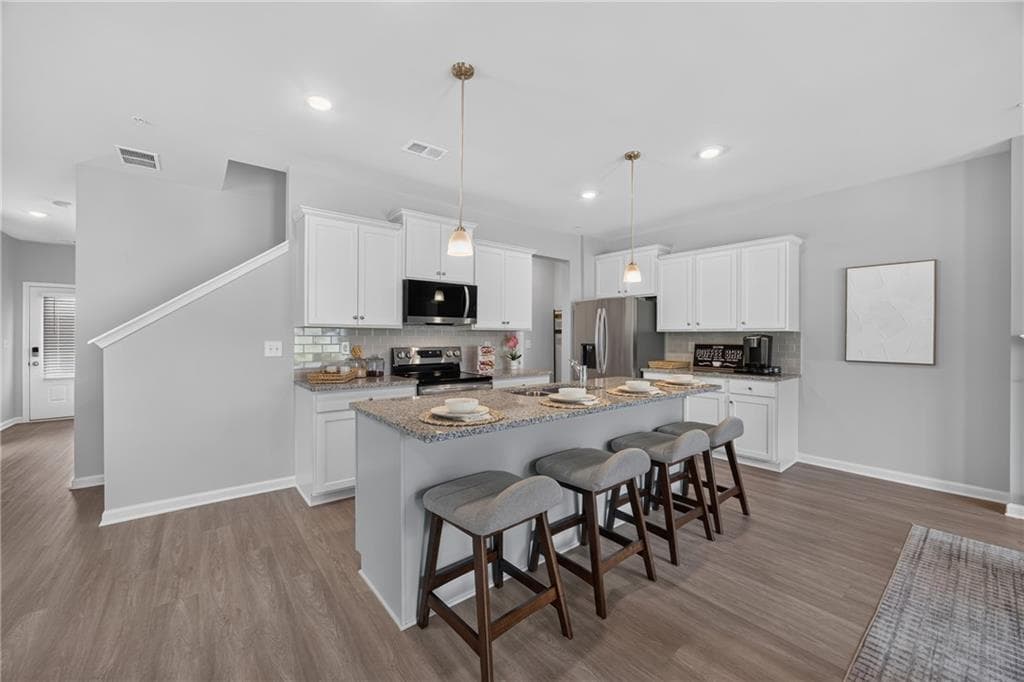 4 bedroom, 3 bathroom, 1,805 sq ft townhouse for sale at 6383 Towhee Way, Morrow, GA 30260 — photo 3