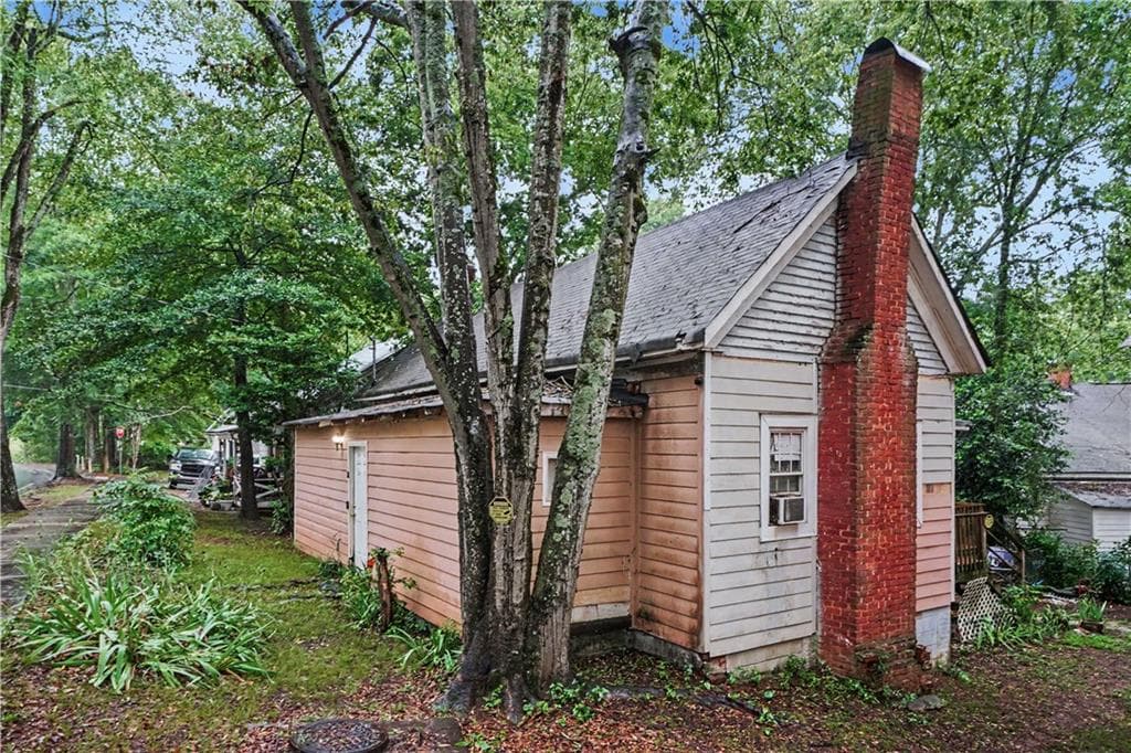 2 bedroom, 2 bathroom, 1,176 sq ft single family residence for sale at 22 S Broad Street, Porterdale, GA 30014 — photo 3