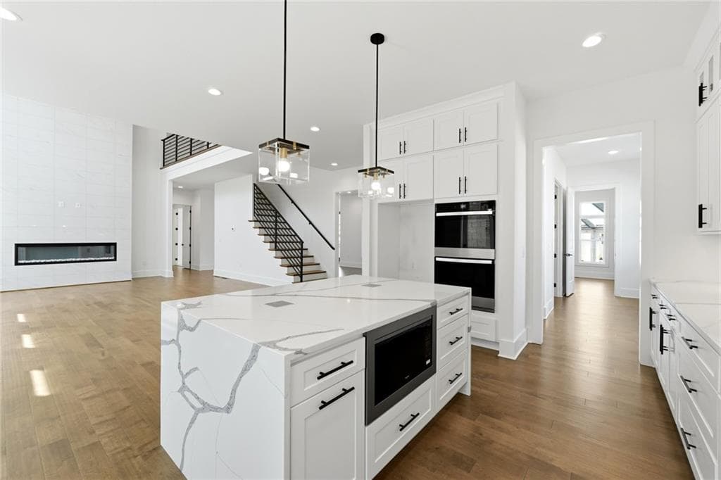 5 bedroom, 4 bathroom, 3,687 sq ft single family residence for sale at 3985 Clifton Hill Court, Cumming, GA 30040 — photo 9
