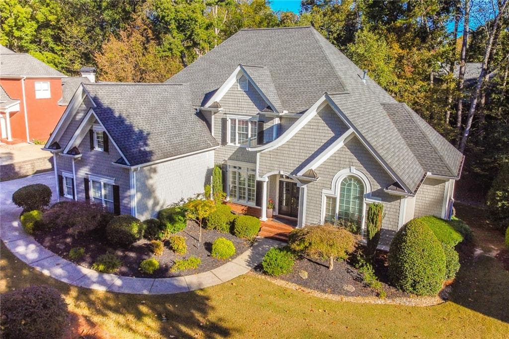 5 bedroom, 5 bathroom, 6,213 sq ft single family residence for sale at 1145 River Laurel Drive, Suwanee, GA 30024 — photo 2