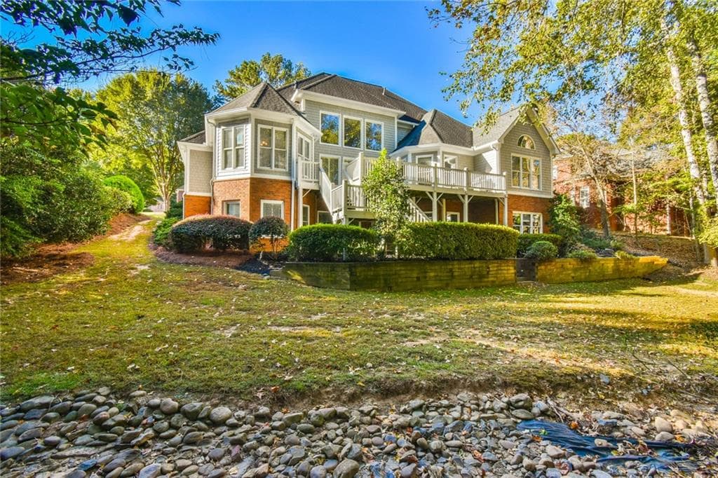 5 bedroom, 5 bathroom, 6,213 sq ft single family residence for sale at 1145 River Laurel Drive, Suwanee, GA 30024 — photo 6