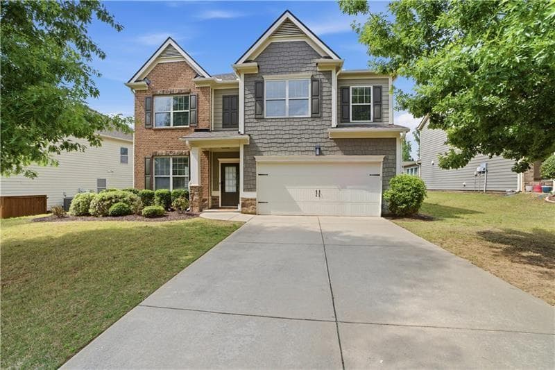 5 bedroom, 4 bathroom, 3,142 sq ft single family residence for sale at 5750 Palmtree Pass, Cumming, GA 30040 — photo 1 of 38