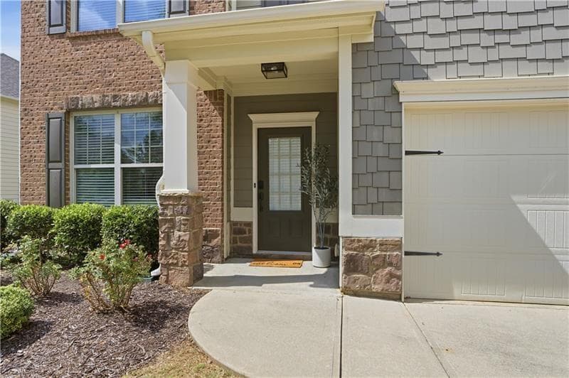 5 bedroom, 4 bathroom, 3,142 sq ft single family residence for sale at 5750 Palmtree Pass, Cumming, GA 30040 — photo 3