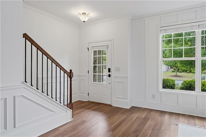 5 bedroom, 4 bathroom, 3,142 sq ft single family residence for sale at 5750 Palmtree Pass, Cumming, GA 30040 — photo 4