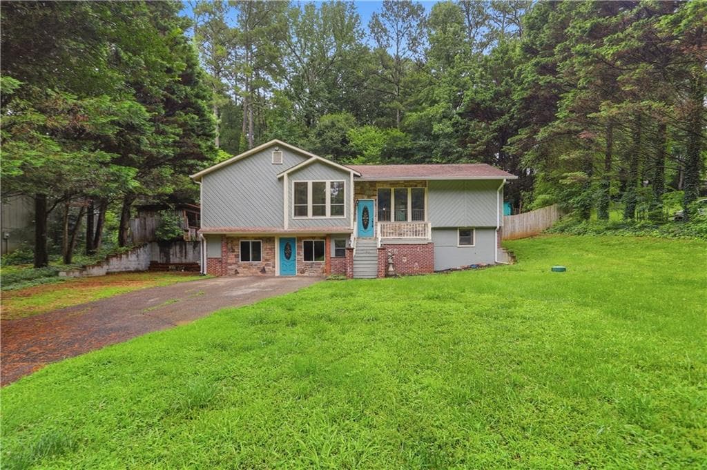 3 bedroom, 2 bathroom, 2,629 sq ft single family residence for sale at 3634 N Hampton Drive, Kennesaw, GA 30144 — photo 1 of 43