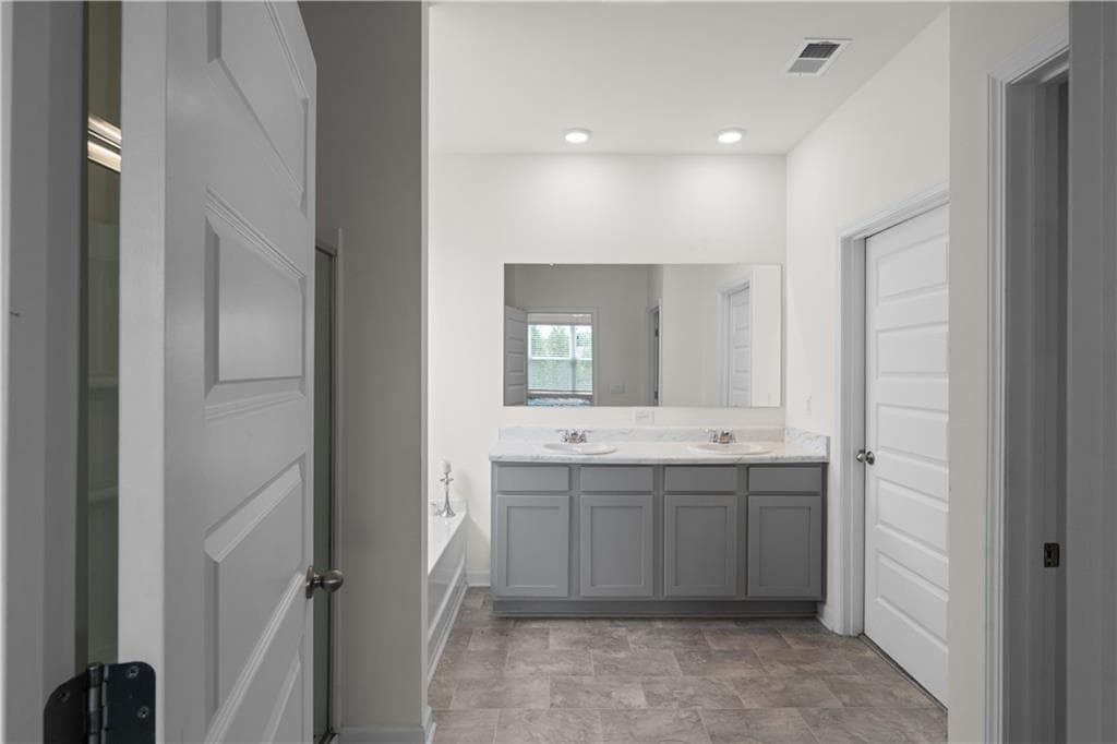 5 bedroom, 4 bathroom, 2,752 sq ft single family residence for sale at 245 Canberra Way, Locust Grove, GA 30248 — photo 10