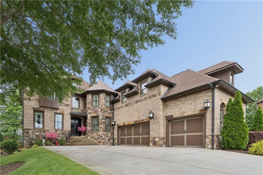 6 bedroom, 7 bathroom, 6,434 sq ft single family residence for rent at 2660 Springbluff Court, Buford, GA 30519 for $10,500 a month — photo 1 of 30