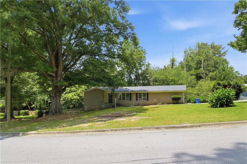 4 bedroom, 3 bathroom, 2,985 sq ft single family residence for sale at 6735 Marlborough Circle, Atlanta, GA 30349