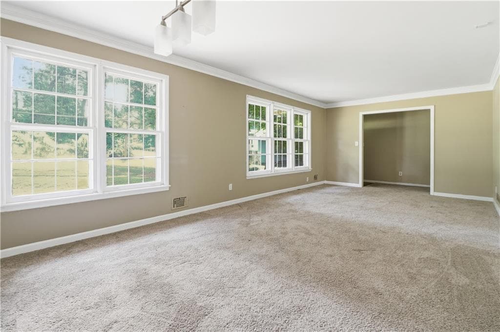 4 bedroom, 3 bathroom, 2,985 sq ft single family residence for sale at 6735 Marlborough Circle, Atlanta, GA 30349 — photo 5