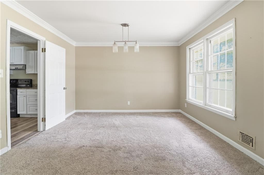 4 bedroom, 3 bathroom, 2,985 sq ft single family residence for sale at 6735 Marlborough Circle, Atlanta, GA 30349 — photo 6