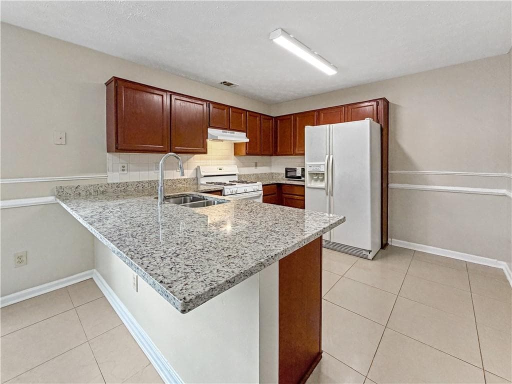 3 bedroom, 2 bathroom, 1,663 sq ft single family residence for sale at 1435 Wheatfield Drive, Lawrenceville, GA 30043 — photo 10