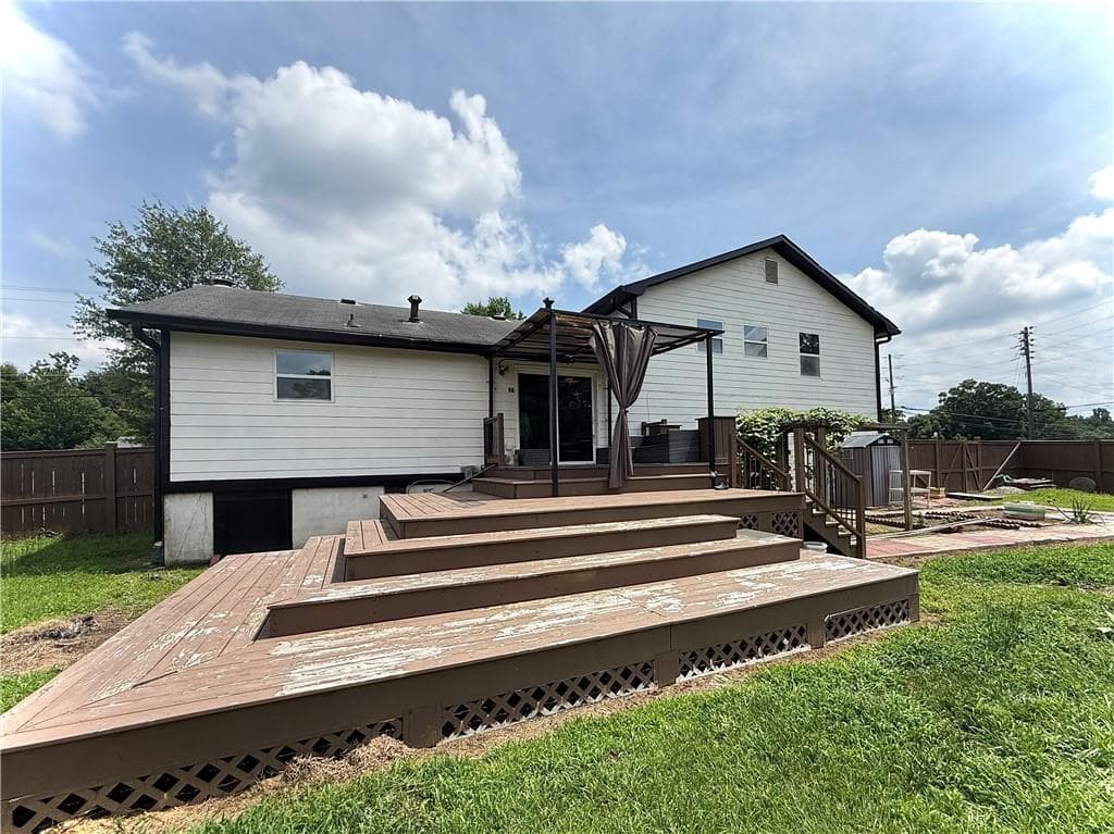 3 bedroom, 2 bathroom, 31,363 sq ft single family residence for sale at 1861 Pharr Road, Snellville, GA 30078 — photo 5