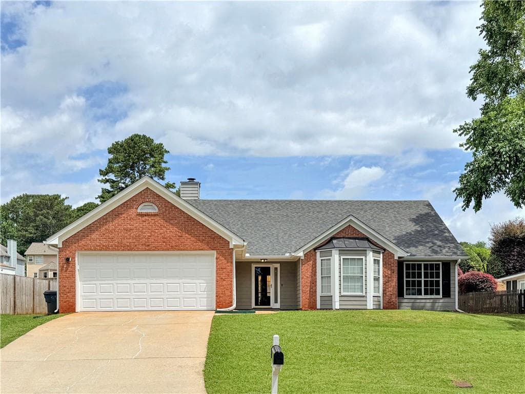 3 bedroom, 2 bathroom, 1,663 sq ft single family residence for sale at 1435 Wheatfield Drive, Lawrenceville, GA 30043 — photo 1 of 40