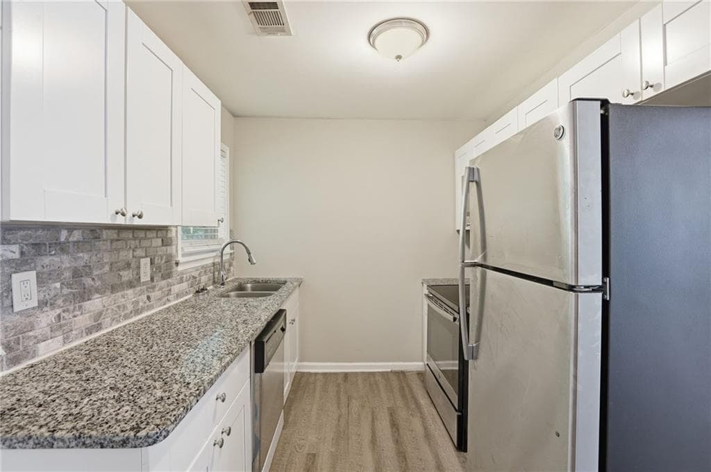 3 bedroom, 2 bathroom, 1,000 sq ft single family residence for sale at 3410 Adkins Road, Atlanta, GA 30331 — photo 4