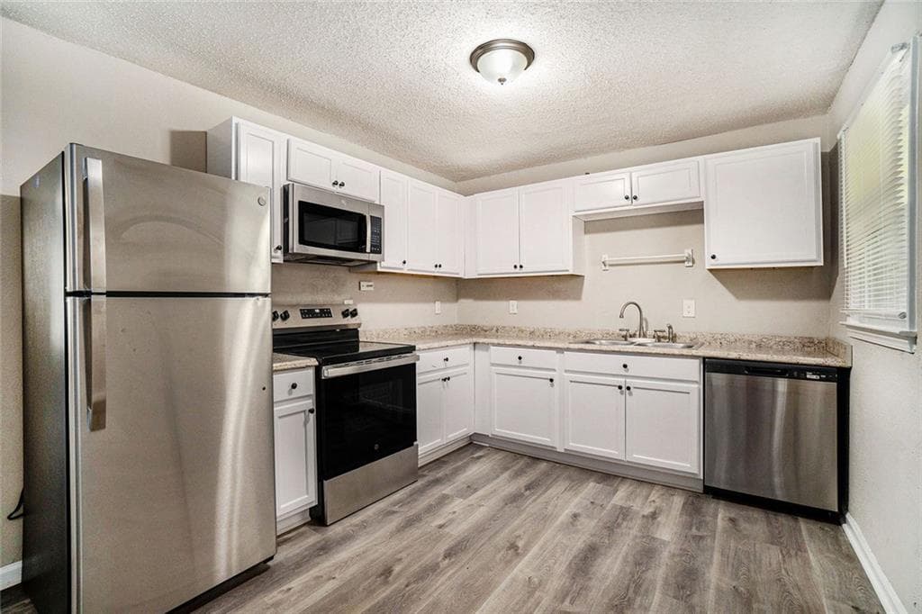 3 bedroom, 1 bathroom, 1,066 sq ft single family residence for sale at 114 Howell Drive, Atlanta, GA 30331 — photo 7