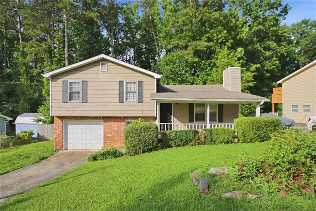 4 bedroom, 2 bathroom, 1,445 sq ft single family residence for sale at 1496 Cherry Hill Road, Conyers, GA 30094