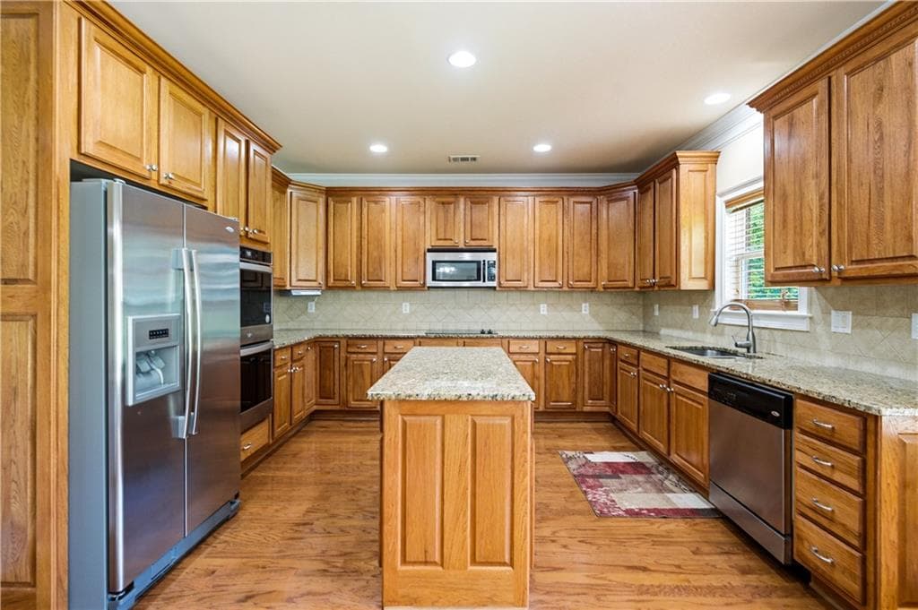 5 bedroom, 4 bathroom, 3,795 sq ft single family residence for sale at 4200 Donington Way, Hampton, GA 30228 — photo 6