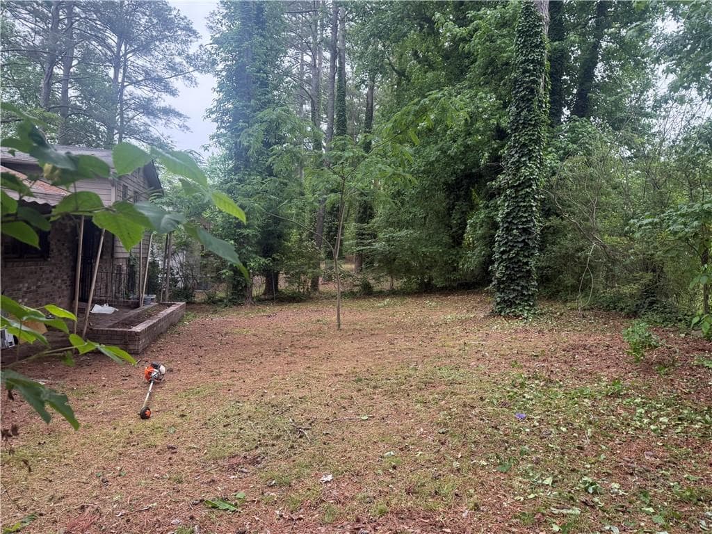 4 bedroom, 2 bathroom, 1,576 sq ft single family residence for sale at 2930 Carriage Lane, South Fulton, GA 30349 — photo 3
