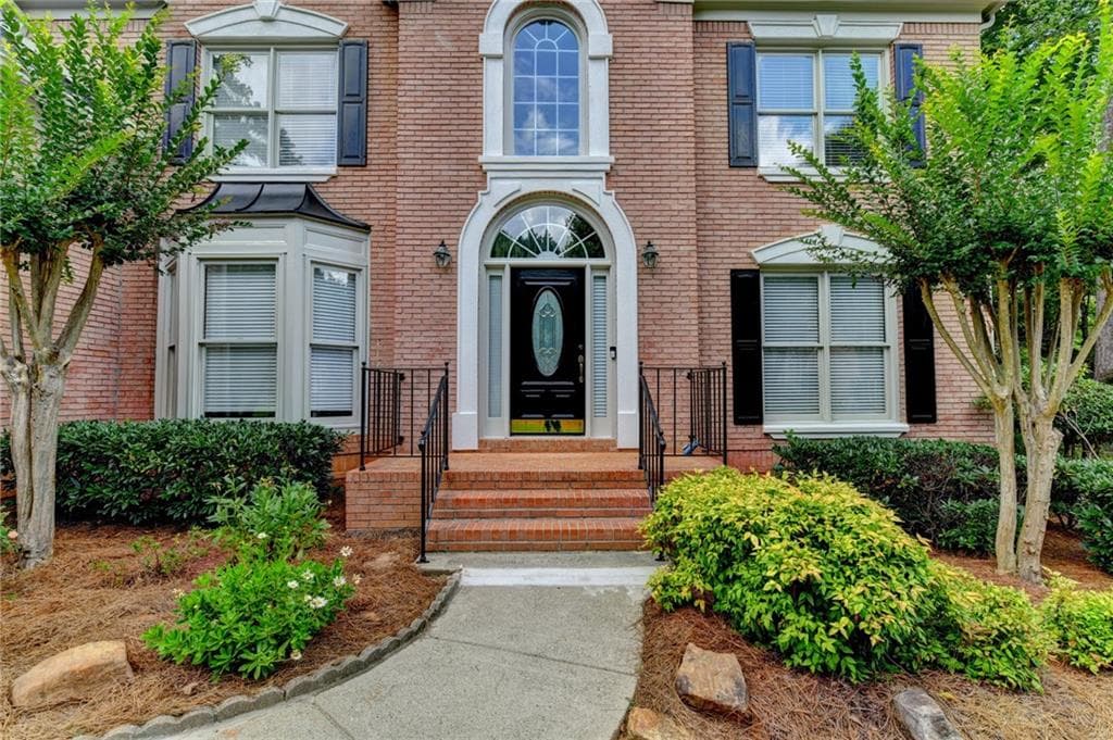 5 bedroom, 4 bathroom, 3,881 sq ft single family residence for sale at 10645 Honey Brook Circle, Johns Creek, GA 30097 — photo 3