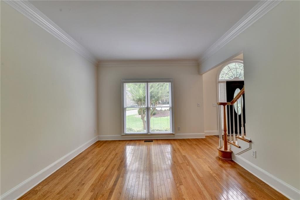 5 bedroom, 4 bathroom, 3,881 sq ft single family residence for sale at 10645 Honey Brook Circle, Johns Creek, GA 30097 — photo 7