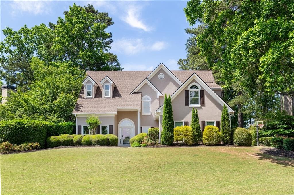 5 bedroom, 4 bathroom, 4,394 sq ft single family residence for sale at 6105 Olde Atlanta Parkway, Suwanee, GA 30024 — photo 2