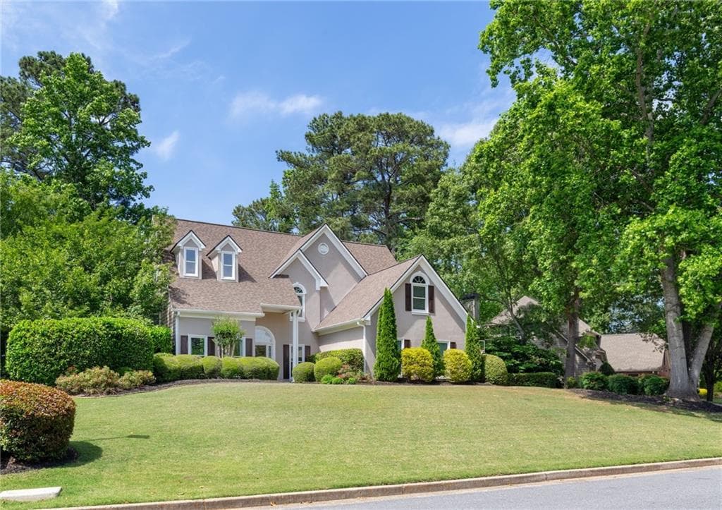 5 bedroom, 4 bathroom, 4,394 sq ft single family residence for sale at 6105 Olde Atlanta Parkway, Suwanee, GA 30024 — photo 4