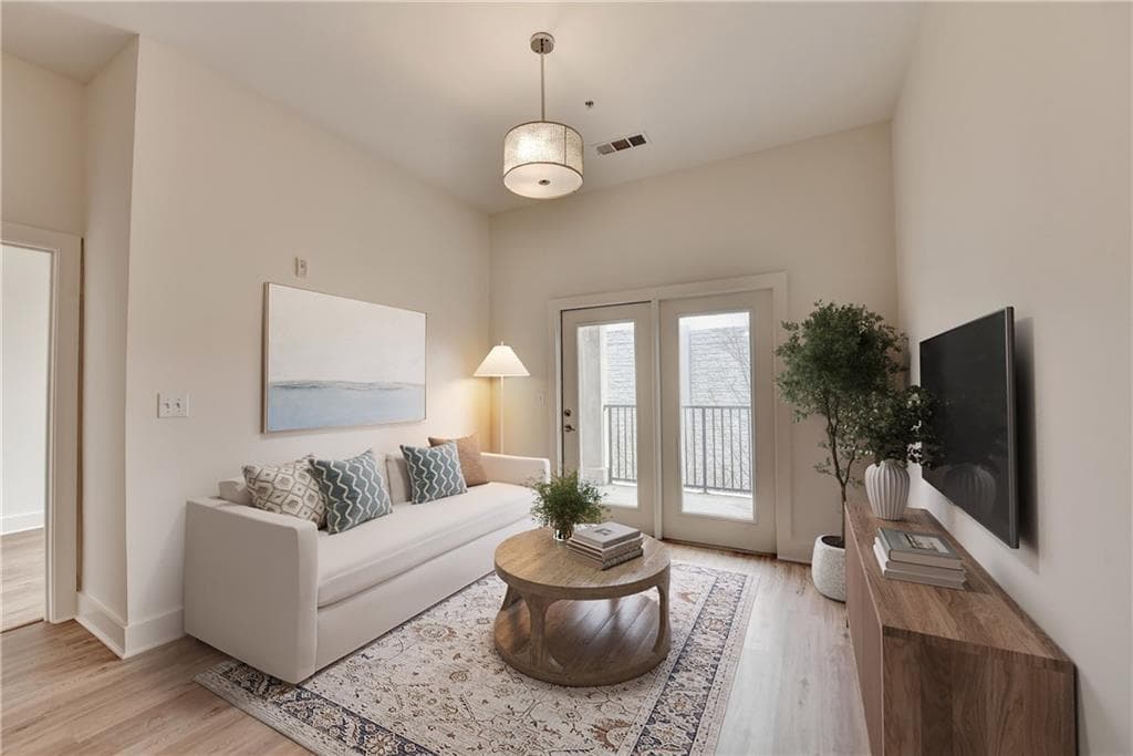 2 bedroom, 2 bathroom, 1,014 sq ft condominium for sale at 799 Hammond Drive 123, Atlanta, GA 30328 — photo 1 of 44