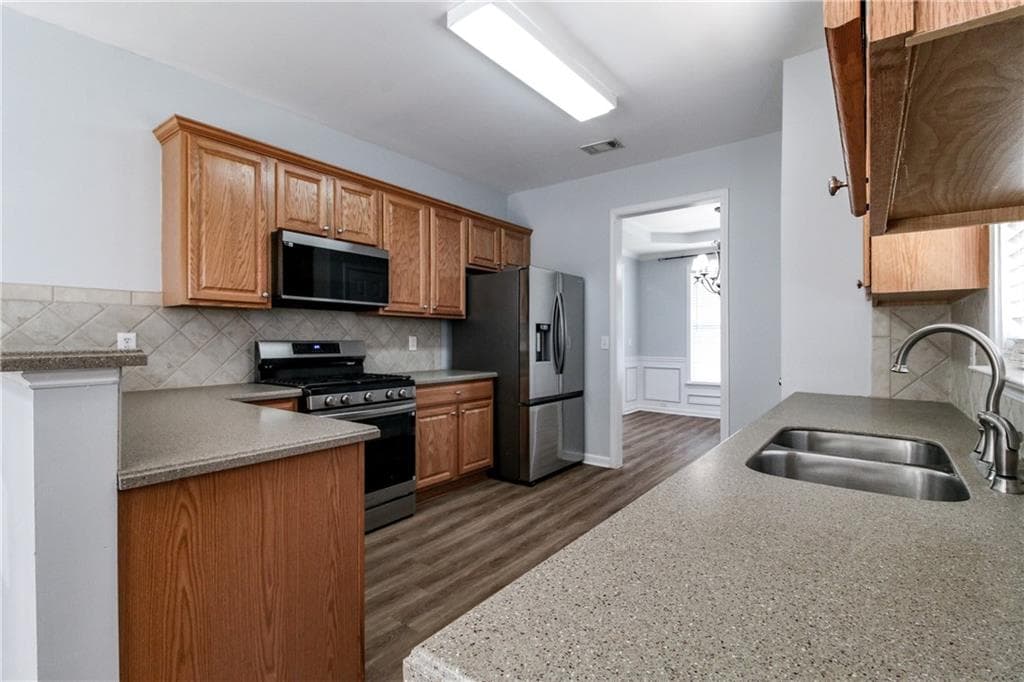 4 bedroom, 3 bathroom, 2,516 sq ft single family residence for sale at 3106 Delacorte Drive, Acworth, GA 30101 — photo 4