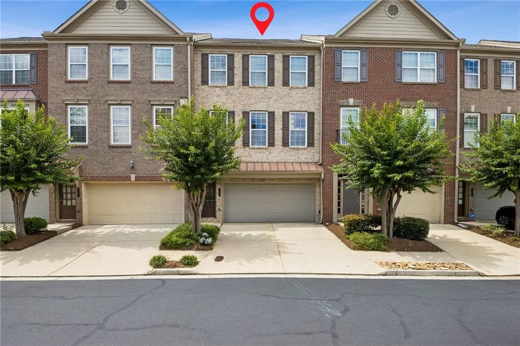 3 bedroom, 4 bathroom, 2,566 sq ft townhouse for sale at 3279 Greenwood Oak Drive, Peachtree Corners, GA 30092