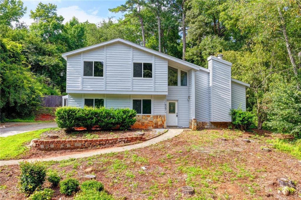 7 bedroom, 4 bathroom, 2,871 sq ft single family residence sold at 6567 Oakwood Drive, Douglasville, GA 30135