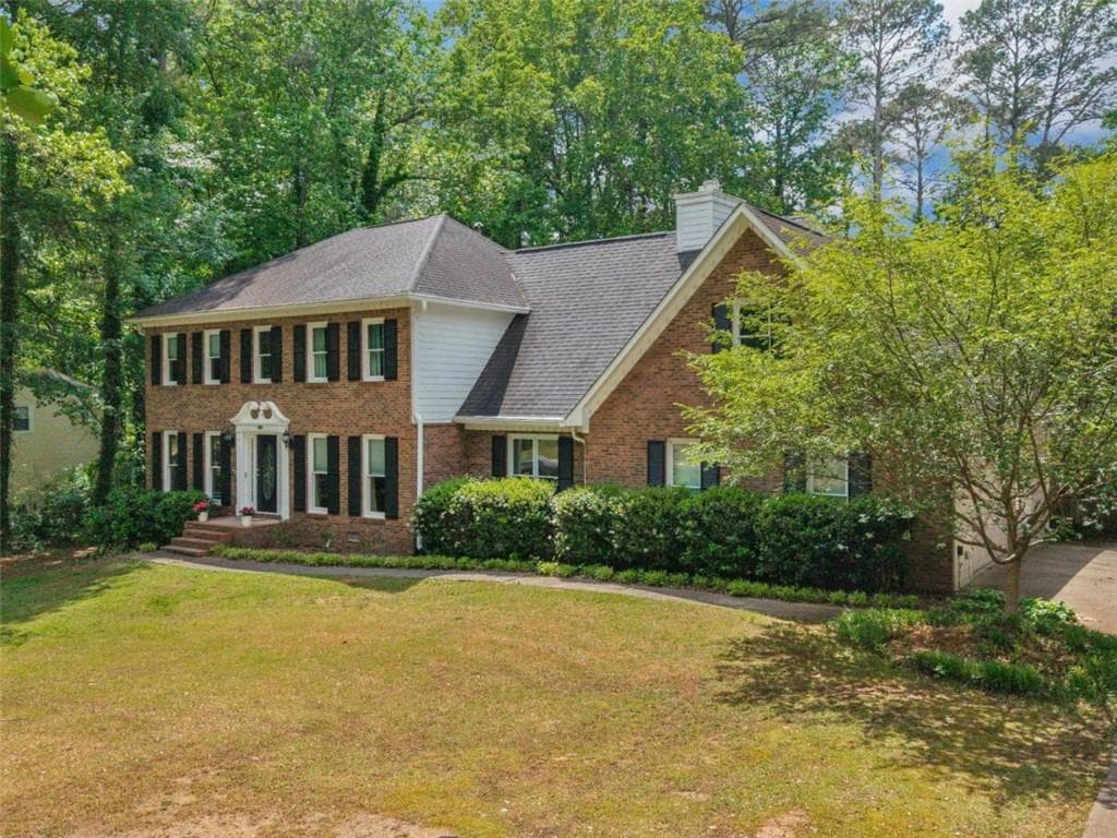 4 bedroom, 3 bathroom, 4,000 sq ft single family residence for sale at 8601 N Shore Drive, Jonesboro, GA 30236 — photo 3