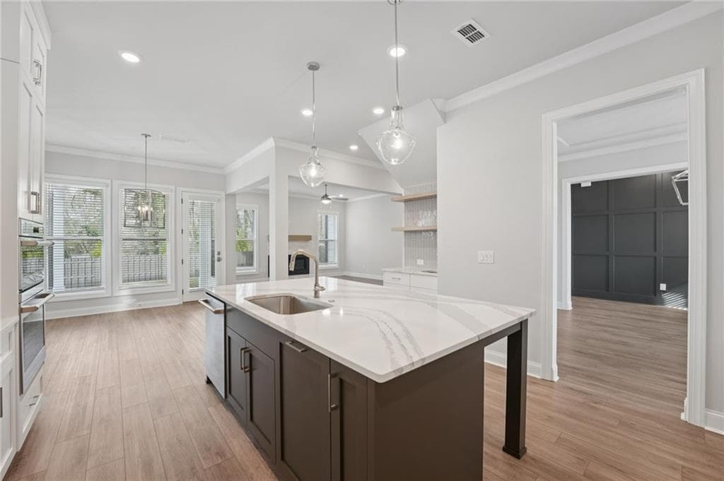 3 bedroom, 4 bathroom, 3,140 sq ft single family residence for sale at 572 Sawnee Village Boulevard, Cumming, GA 30040 — photo 2