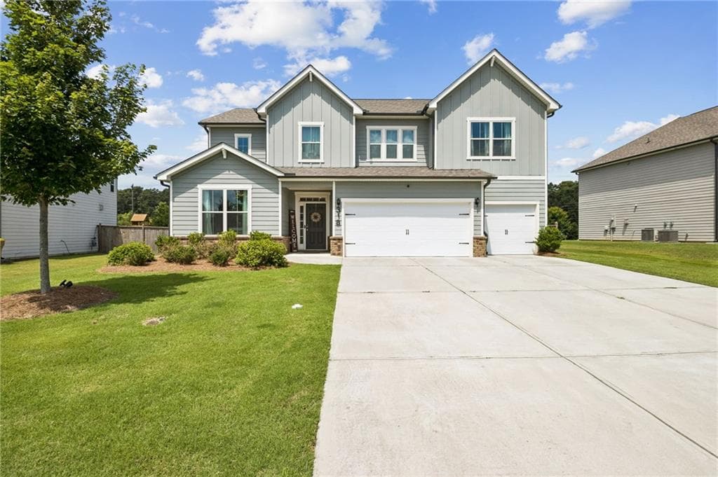 5 bedroom, 4 bathroom, 3,129 sq ft single family residence for sale at 318 Cattail Lane, Winder, GA 30680 — photo 3