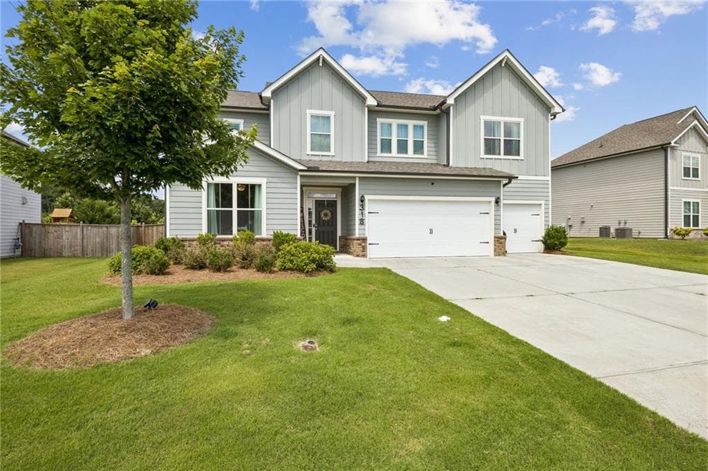 5 bedroom, 4 bathroom, 3,129 sq ft single family residence for sale at 318 Cattail Lane, Winder, GA 30680 — photo 4